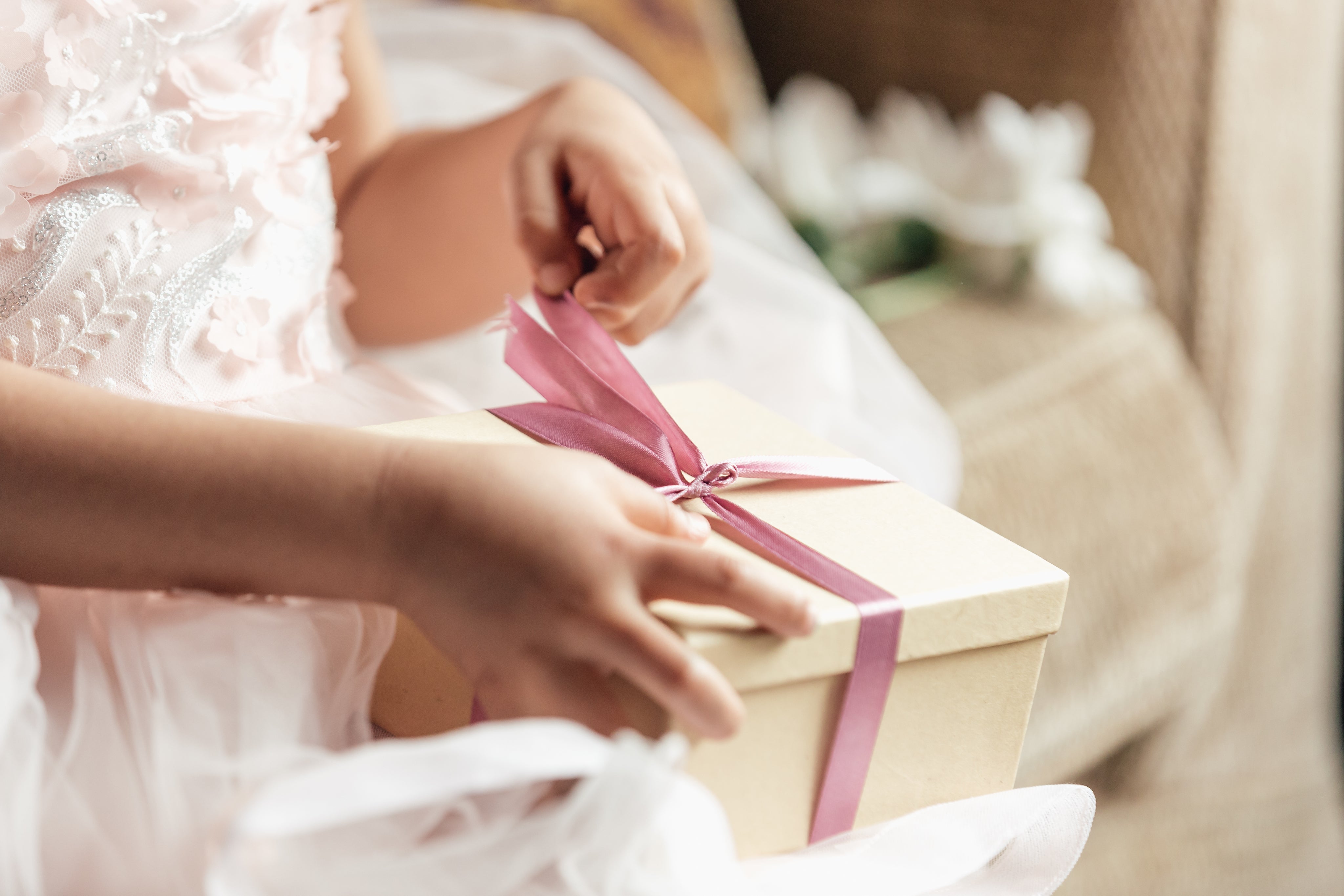 young-girl-opening-gift.jpg